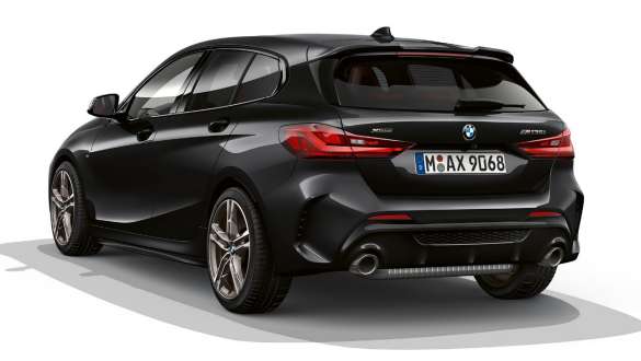 M Aerodynamics package. BMW M135i xDrive in Black Sapphire metallic, rear view with M Aerodynamics package.
