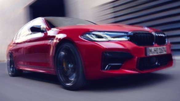 BMW M5 Competition with M xDrive F90 LCI Facelift 2020 three-quarter front view driving BMW M5 Competition with M xDrive F90 LCI Facelift 2020 three-quarter front view driving
