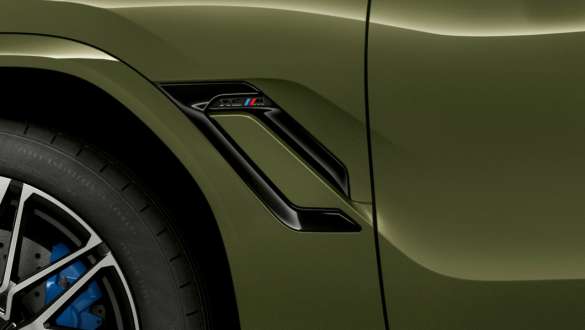 M side gills of the BMW X6 M Competition M side gills BMW X6 M Competition F96 BMW Individual Special Paint Urban Green SUV exterior