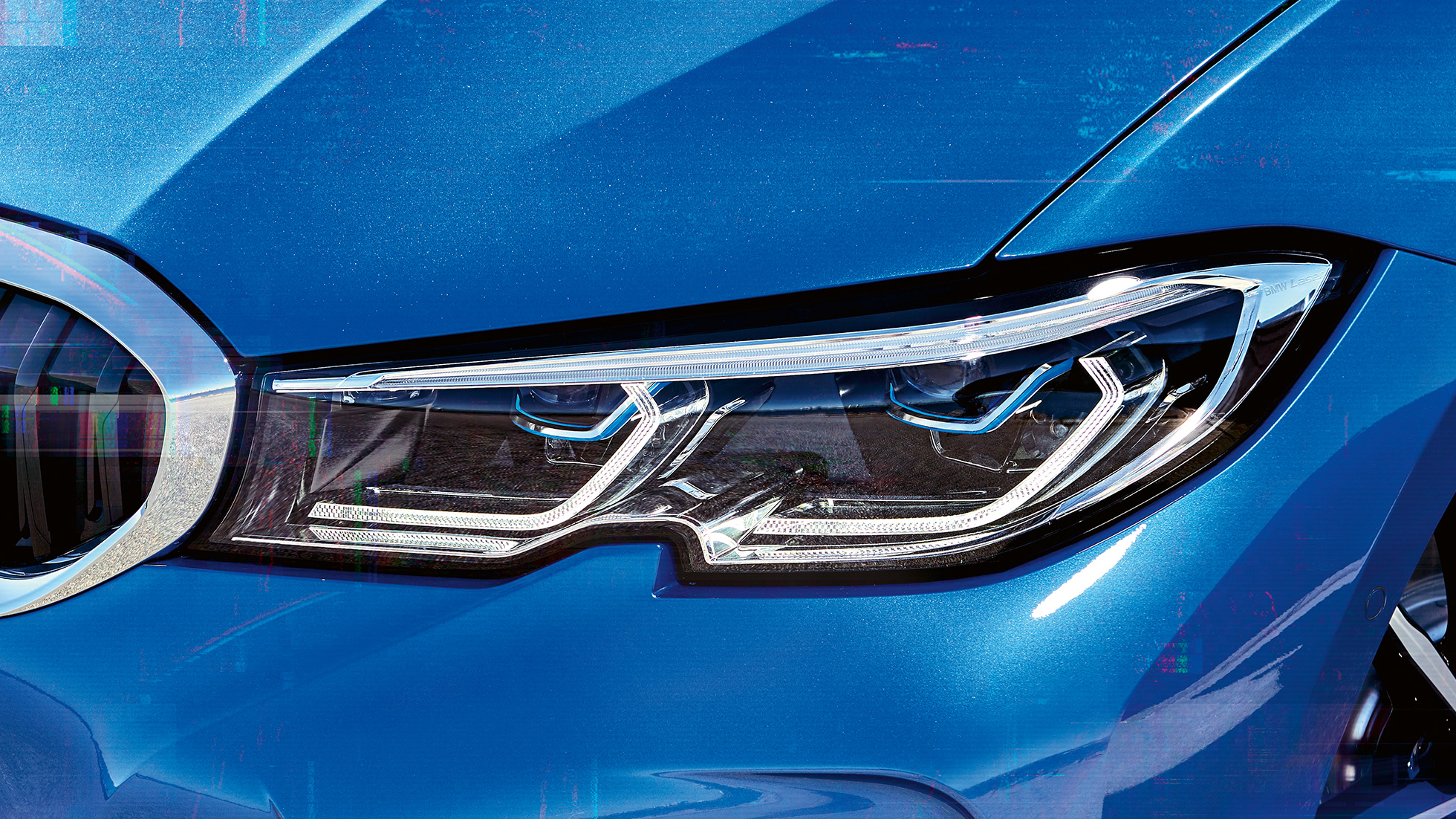 BMW 3 Series Saloon, BMW Laserlight. Lateral close-up of the right front headlights with BMW laserlight.