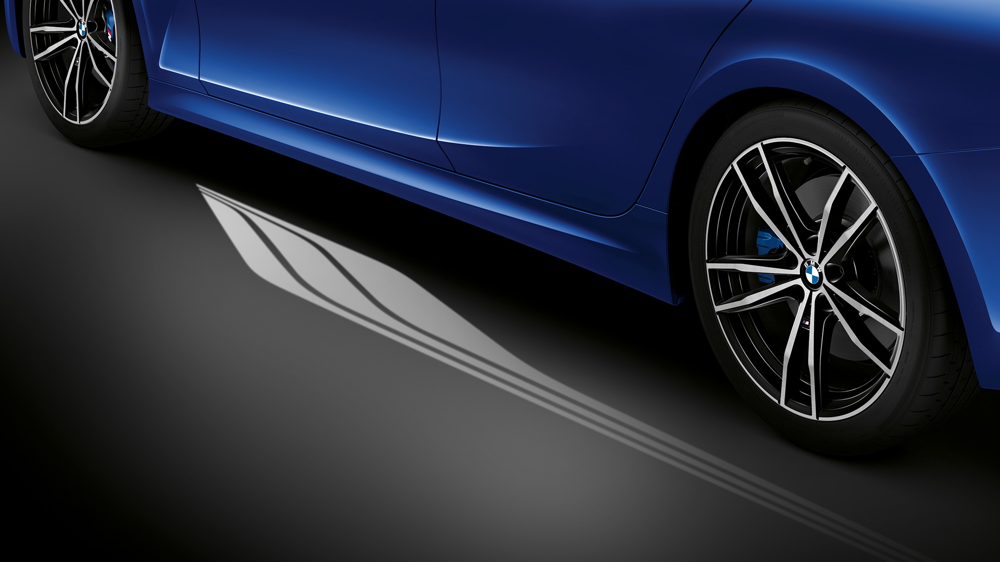 BMW 3 Series Saloon, Welcome Light Carpet. Detailed side view of the open driver's door with Welcome Light Carpet.