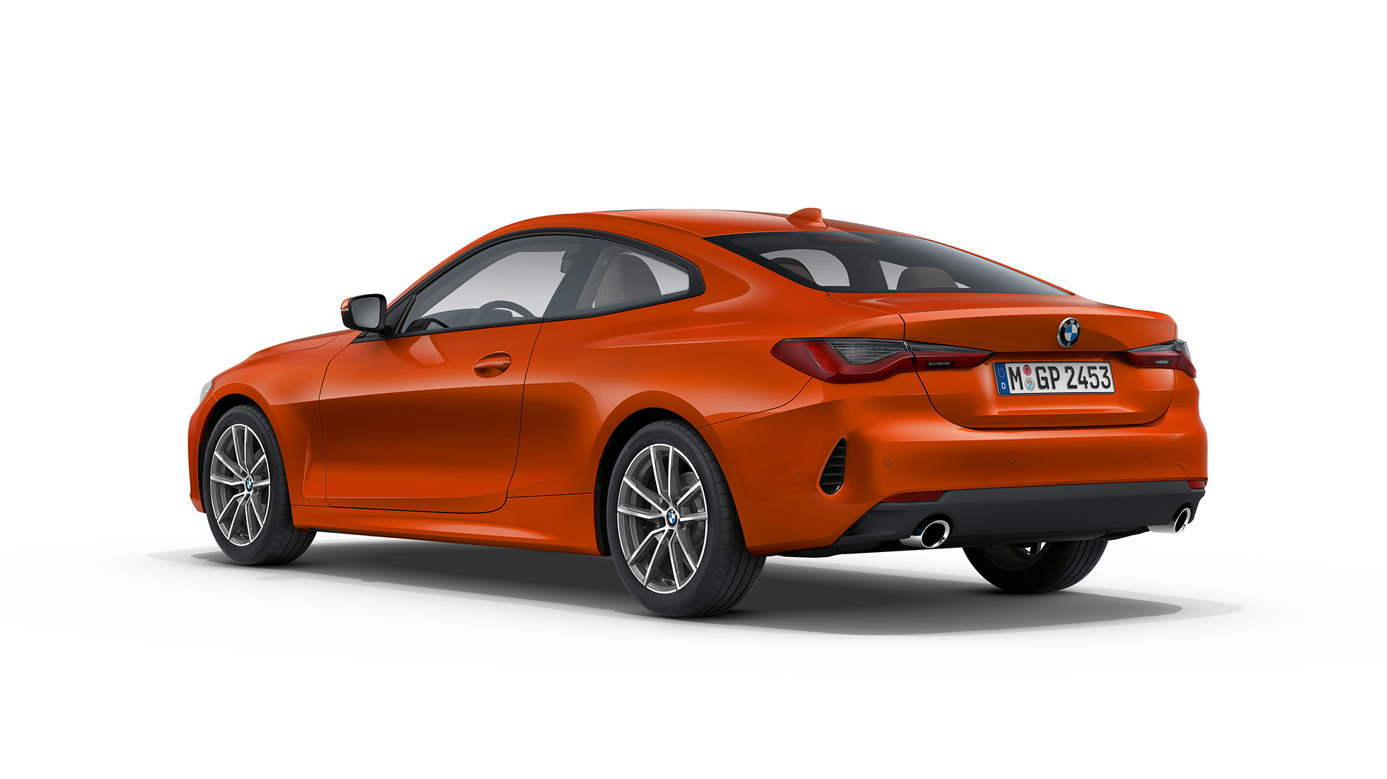 Three-quarter rear view BMW 4 Series Coupé Basic equipment G22 2020 BMW 4 Series Coupé G22 2020 Basic equipment Sunset Orange metallic three-quarter rear view