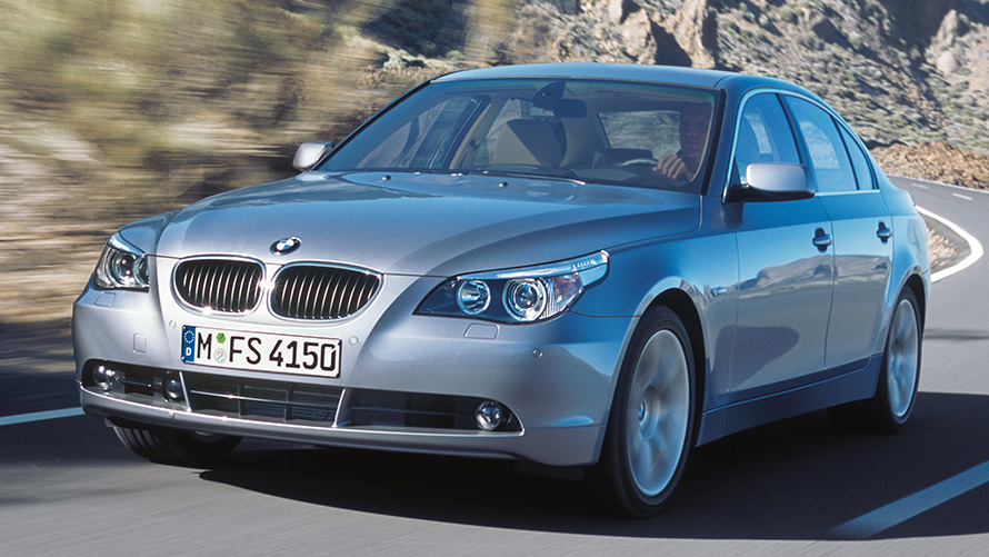 BMW 5 Series Saloon (E60) three-quarter front view driving BMW 5 Series Saloon (E60) three-quarter front view driving