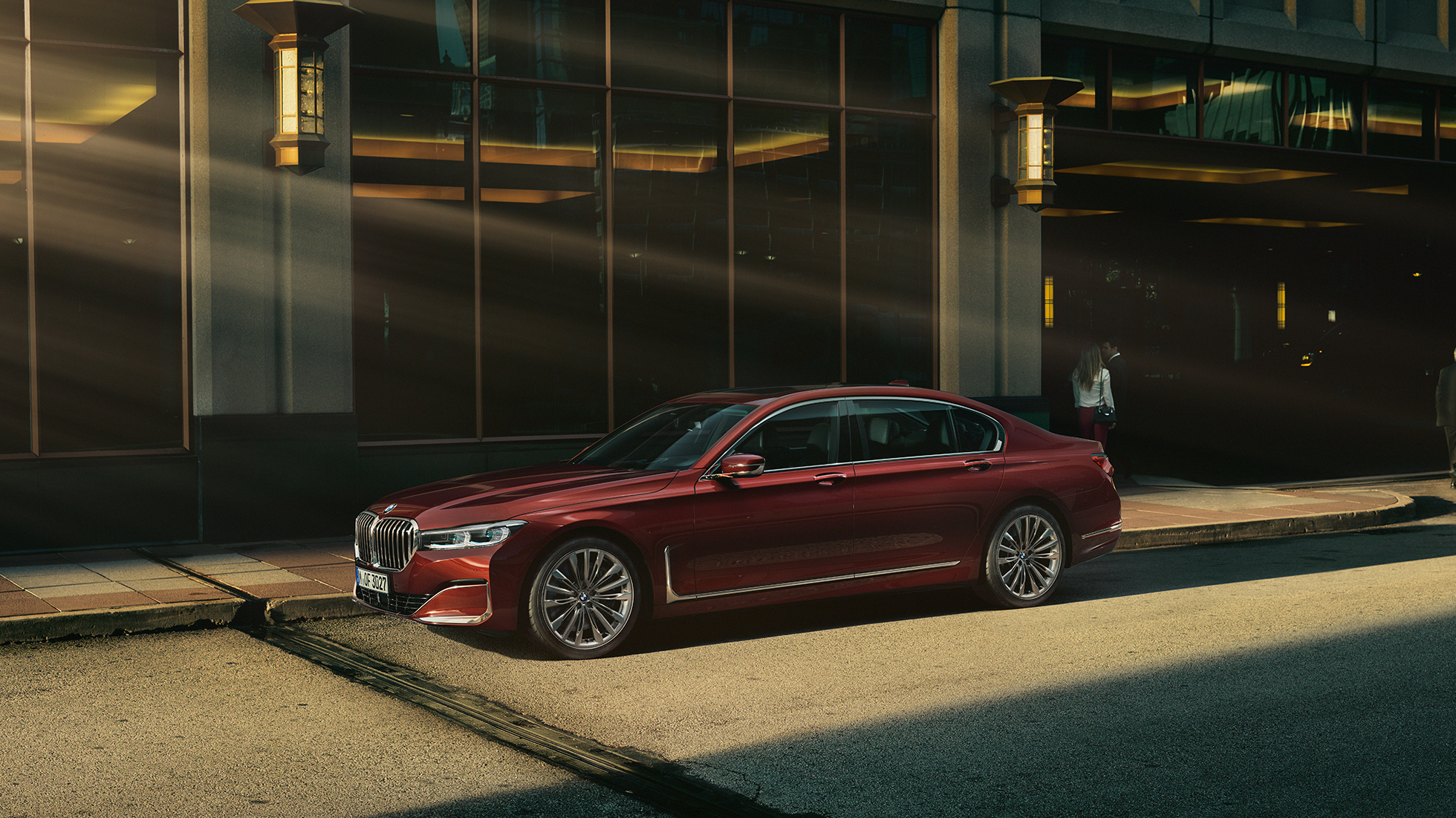 BMW Individual 7 Series Saloon, side view BMW Individual 7 Series Saloon in red in side view in front of urban setting