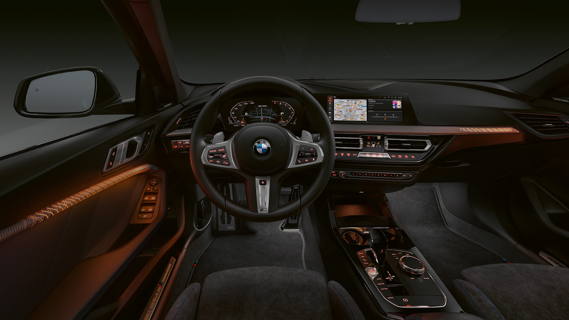 BMW M135i xDrive, cockpit. BMW M135i xDrive premium interior with illuminated interior trim finishers.