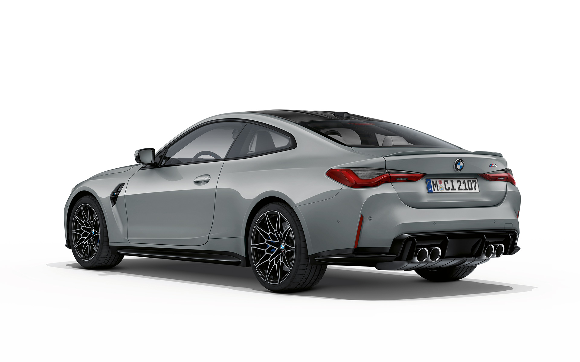 BMW M4 Coupé G82 2020 Brooklyn Grey metallic three-quarter rear view 