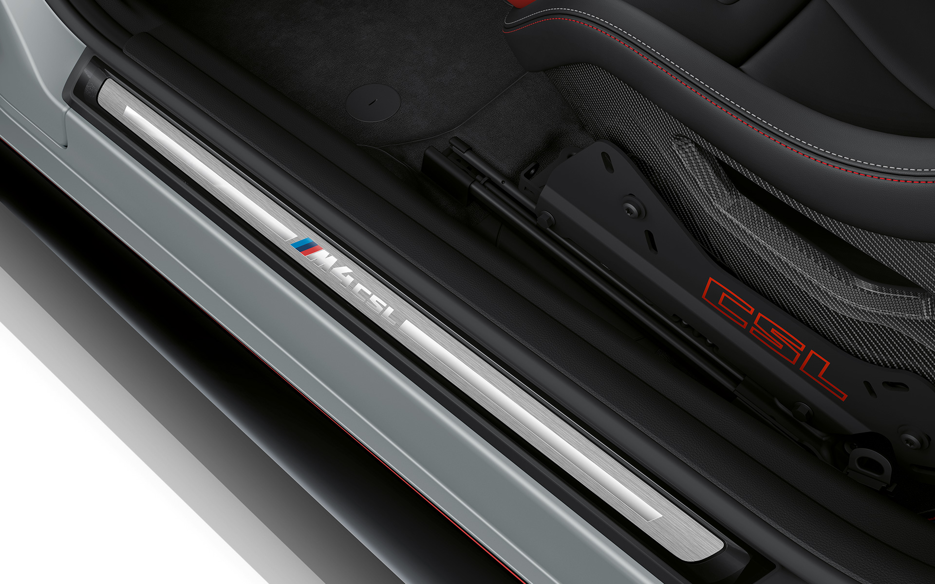 CSL-specific lettering and foil-wrapped door sill finishers BMW M4 CSL G82 BMW M4 CSL G82 BMW Individual Frozen Brooklyn Grey metallic CSL-specific lettering and foil-wrapped door sill finishers