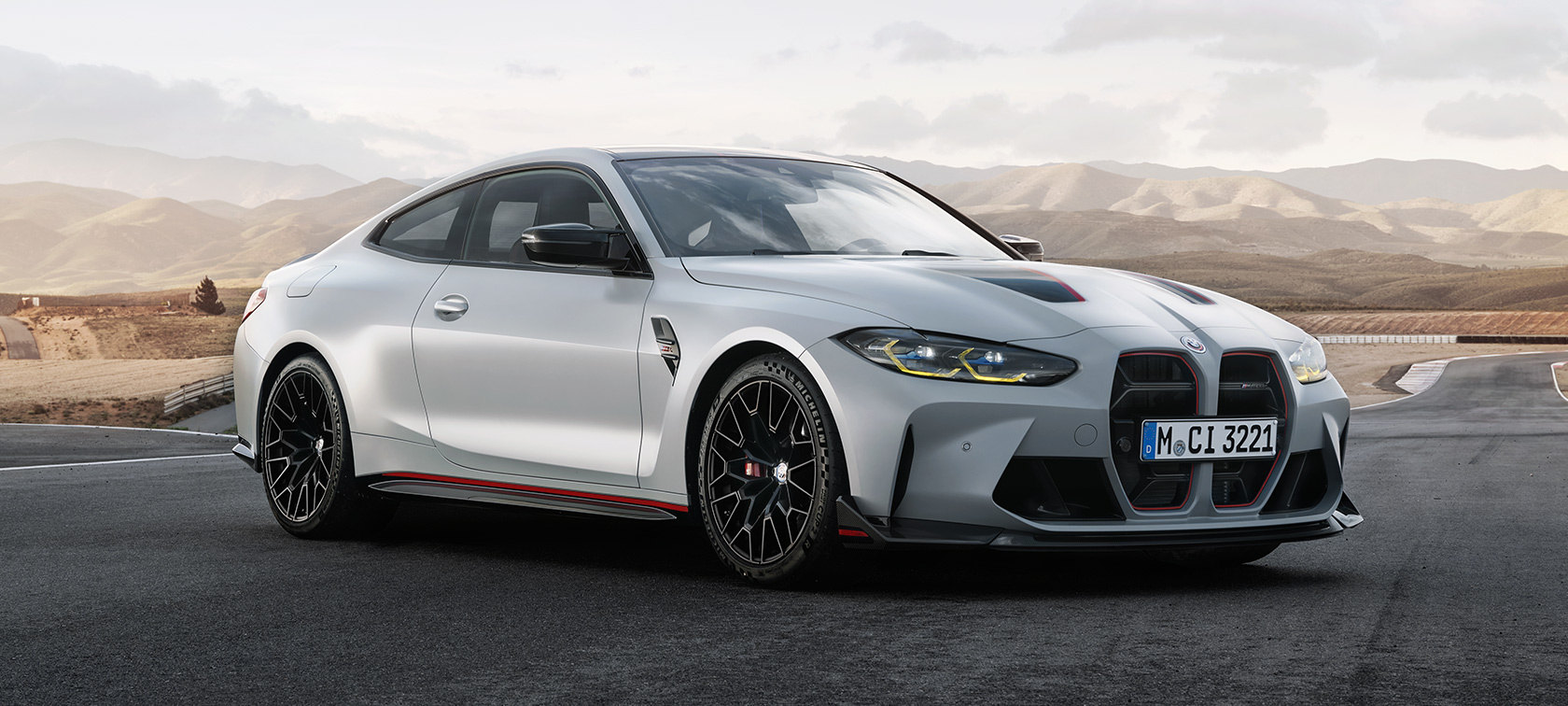BMW M4 CSL G82 three-quarter front view BMW M4 CSL G82 BMW Individual Frozen Brooklyn Grey metallic three-quarter front view