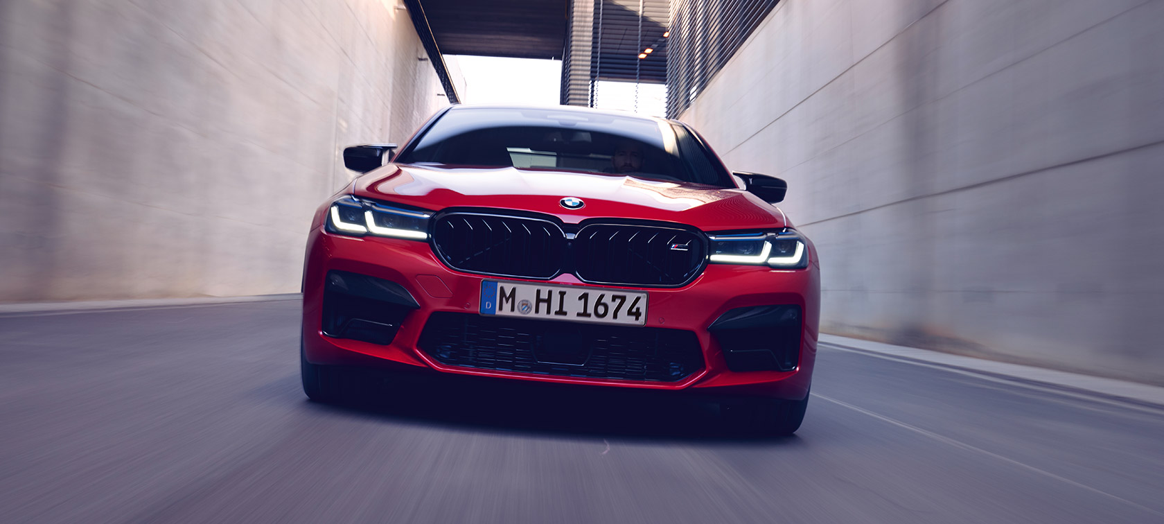 BMW M5 Competition F90 LCI Facelift 2020 front view BMW M5 Competition F90 LCI Facelift 2020 BMW Individual Imola Red front view driving