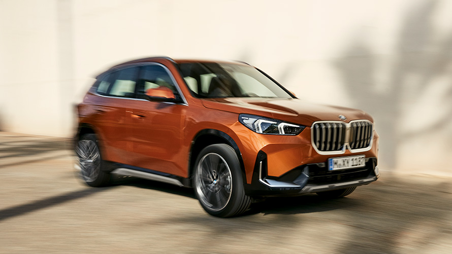 BMW X1 U11 ICE 2022 xLine Utah orange metallic driving dynamics