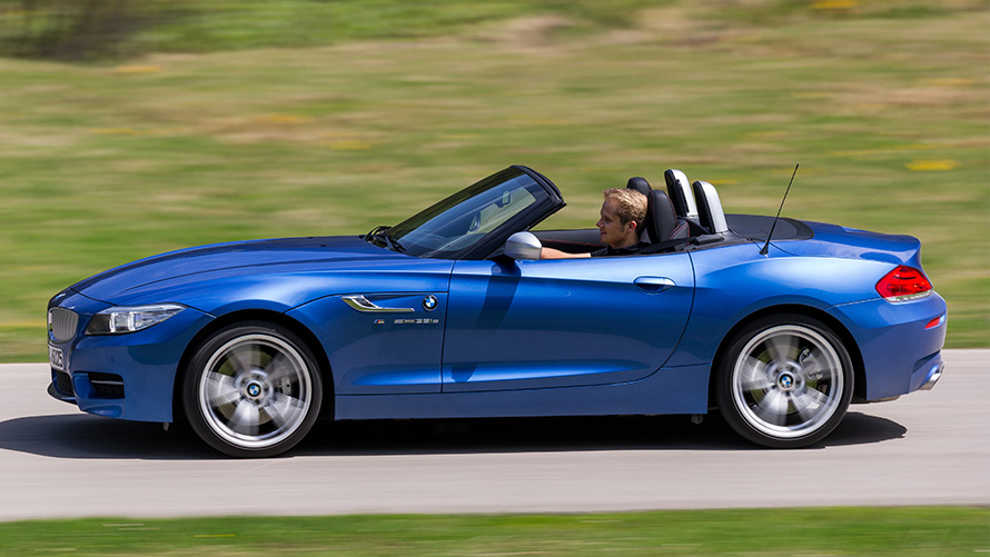 BMW Z4 Roadster (E89) side view driving BMW Z4 Roadster (E89) side view driving