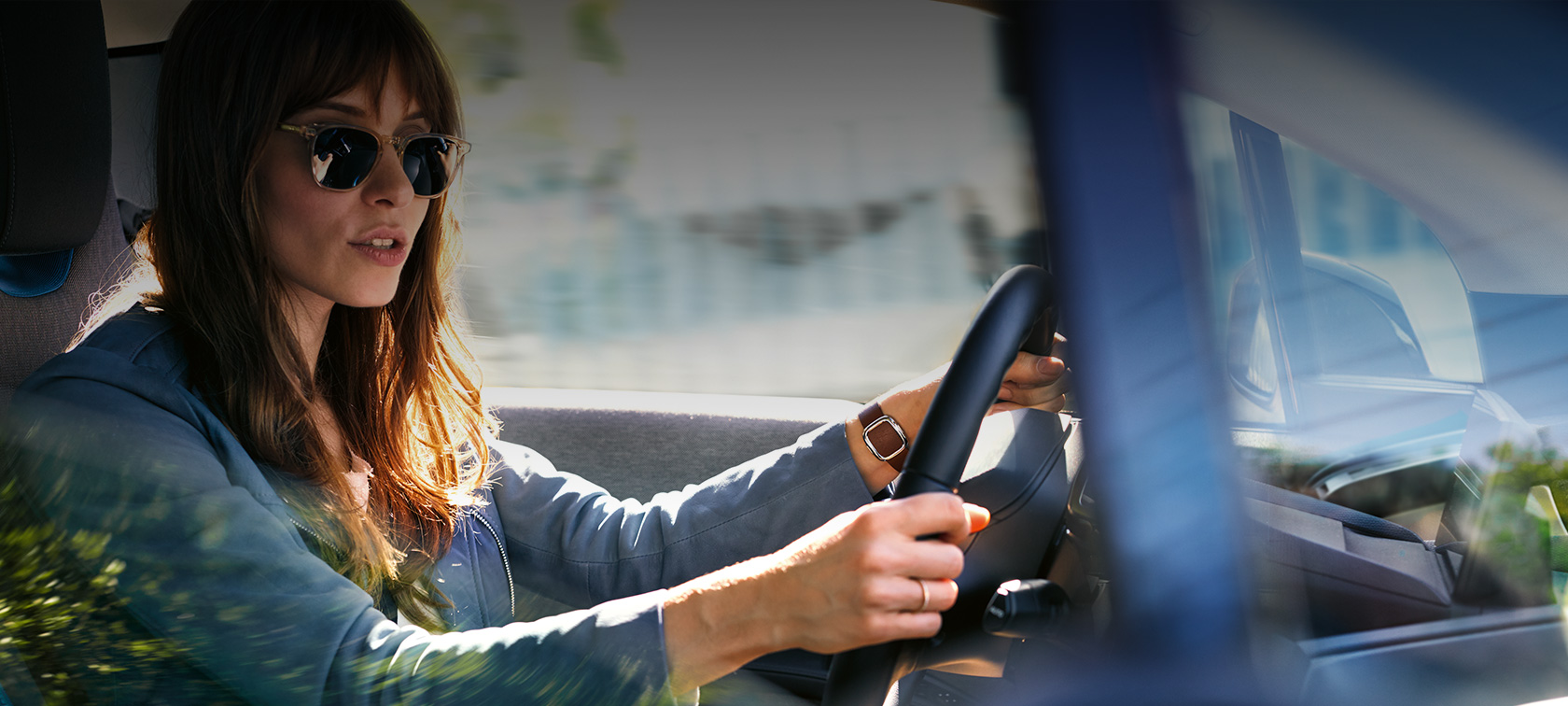 Amazon Alexa Car Integration woman driving a BMW Amazon Alexa Car Integration woman driving a BMW