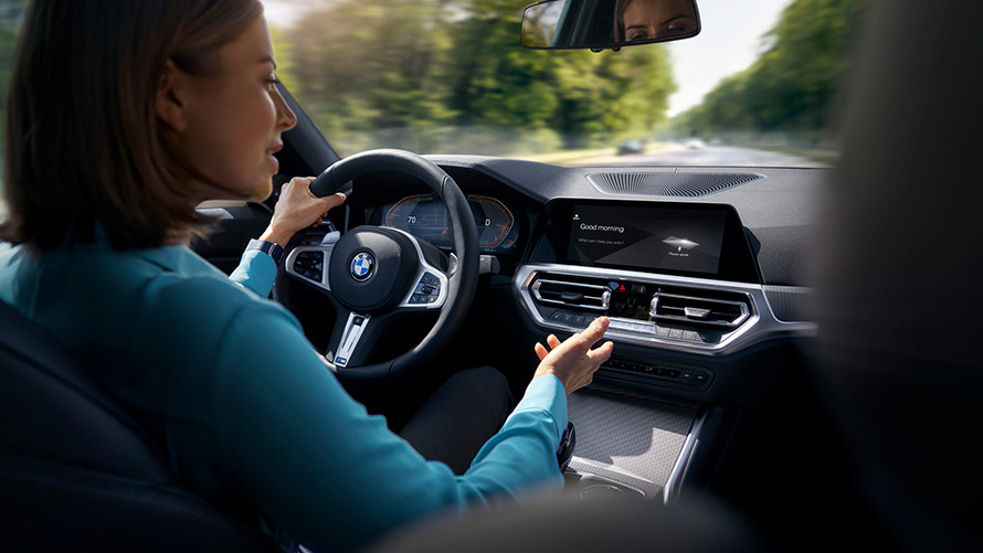 BMW Intelligent Personal Assistant, BMW Car Expert Woman driving in BMW using Car Expert