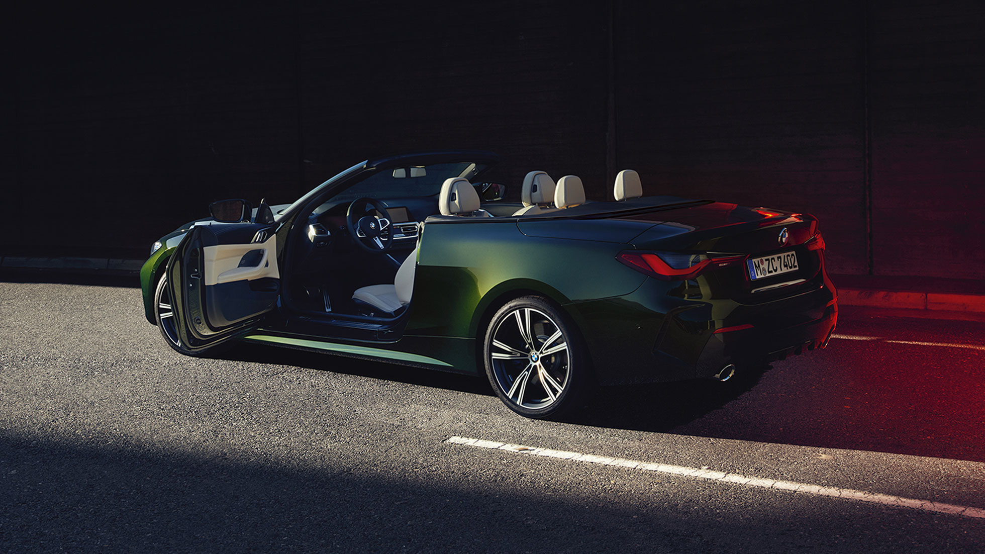 Driving front view BMW 4 Series Convertible G23 2020 BMW 4 Series Convertible G23 2020 Sanremo Green metallic front view driving