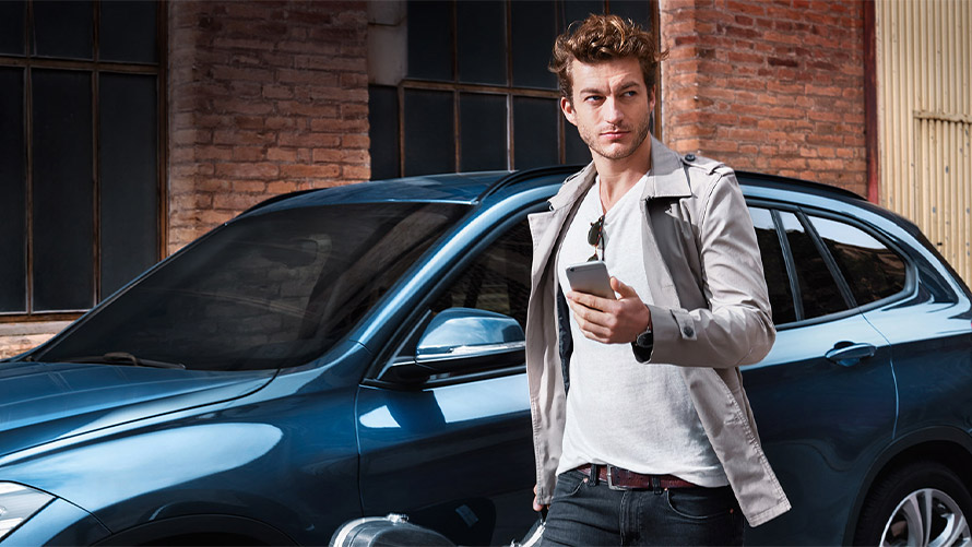 BMW Connected app Man using BMW Connected app