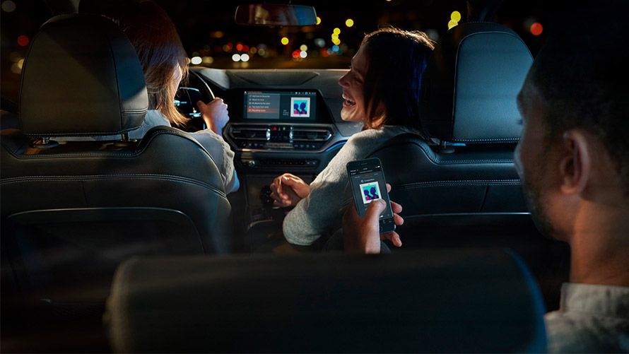 Friends in car using BMW ConnectedDrive Driver Assistance Friends in car using BMW ConnectedDrive Driver Assistance
