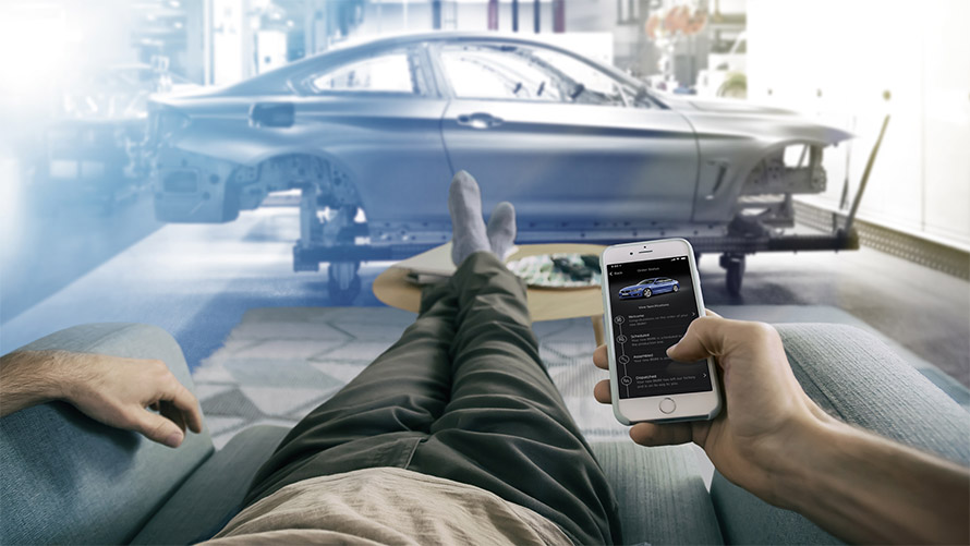 Man using BMW Connected App Man using BMW Connected App