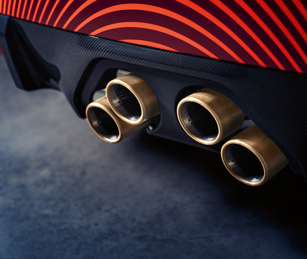 M Performance titanium flap exhaust system with gold bronze tailpipe trims