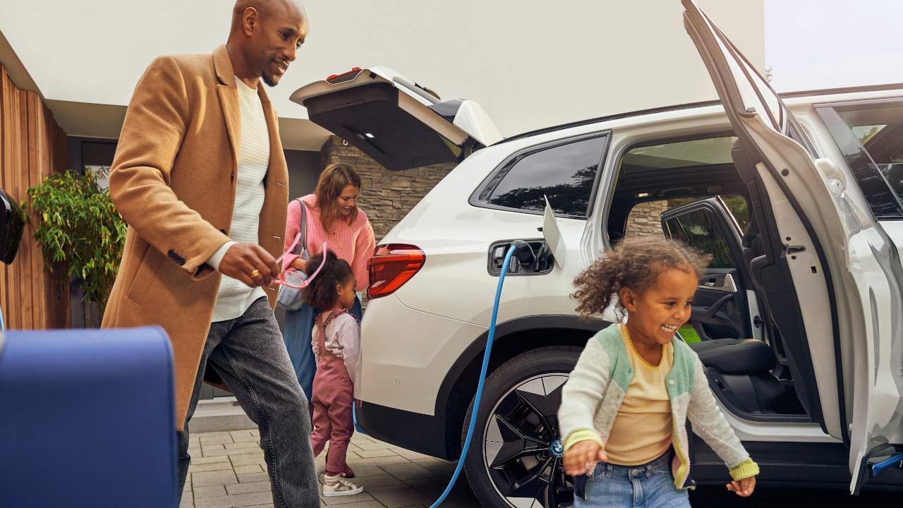 Woman looking at a BMW