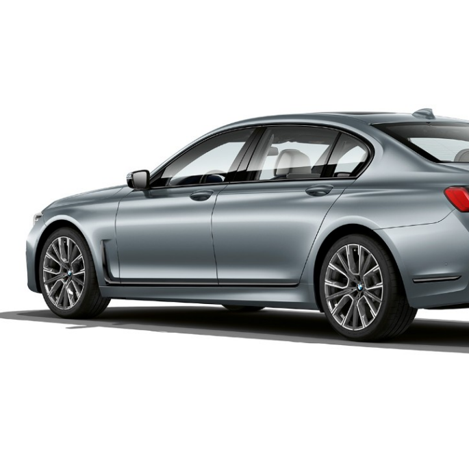 BMW 7 Series Saloon M Sport package, three-quarter rear view Grey BMW 7 Series Saloon M Sport package in three-quarter rear view